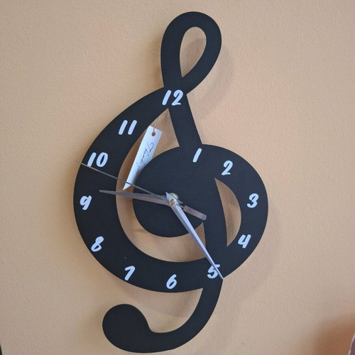 Metal wall clock new, silent operation 35x20 cm
