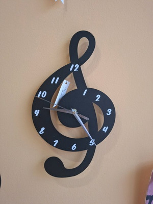 Metal wall clock new, silent operation 35x20 cm