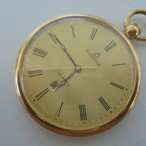 Dugena pocket watch quartz like new, gold color with chain