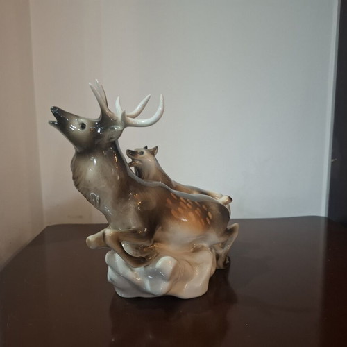 Royal Dux Bohemia porcelain figurine like new, deer and wolf scene