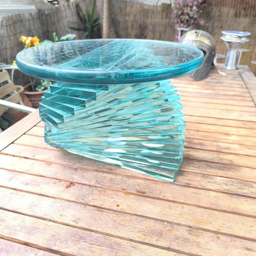 Round coffee table used with glass spiral base