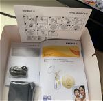 Medela swing pump with extra parts