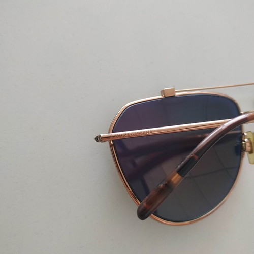 Dolce & Gabbana aviator sunglasses with yellow mirror lenses
