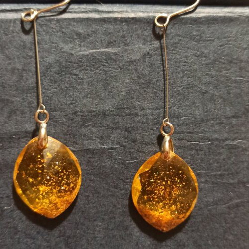 Dangling earrings like new, amber color