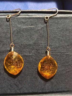 Dangling earrings like new, amber color