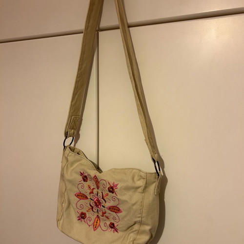 Crossbody bag used with designs