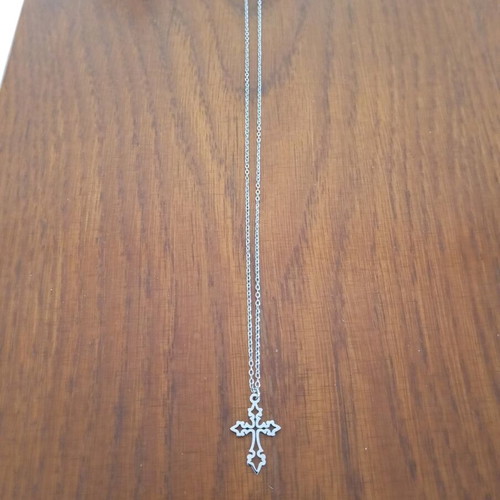 Steel cross like new, silver color