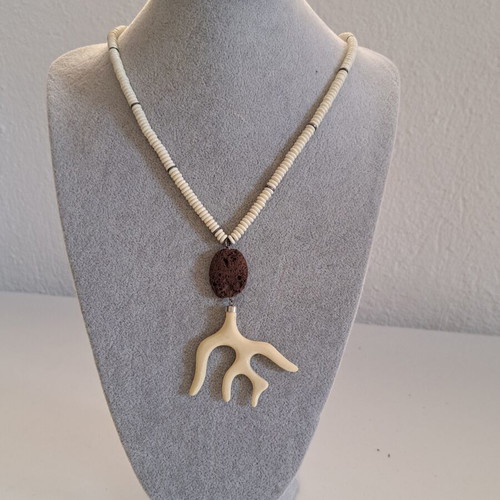 Necklace with white round beads and brown branch motif pendant like new