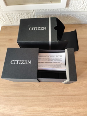 Citizen watch package nj0159-86a like new with booklet and paperwork