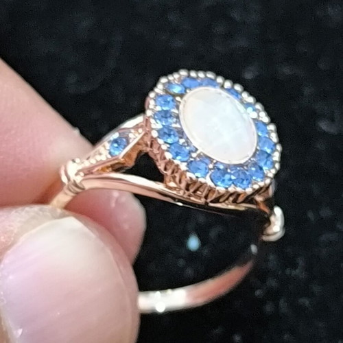 Rose Gold women's ring with white opal and blue crystals, stainless steel