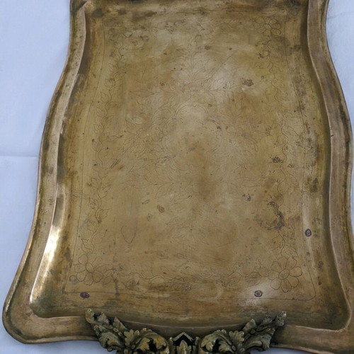 Vintage brass serving tray used with carved handles