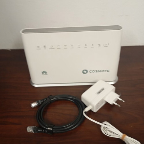 Cosmote hybrid access point with SIM card port