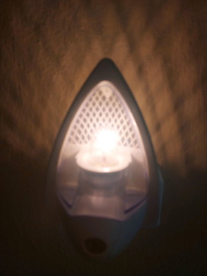 White plug-in night light like new