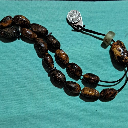Amber Komboloi like new with silver handmade finish and insect bead