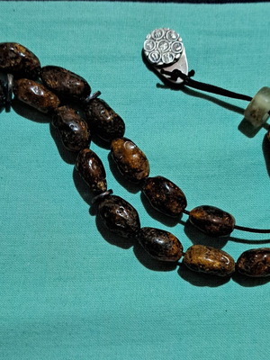 Amber Komboloi like new with silver handmade finish and insect bead