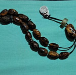 Amber Komboloi like new with silver handmade finish and insect bead