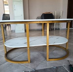 Oval coffee table with marble effect