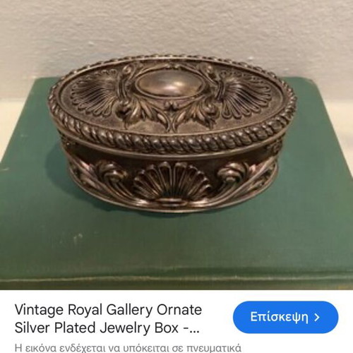 Vintage silver-plated jewelry box new with embossed designs and blue velvet