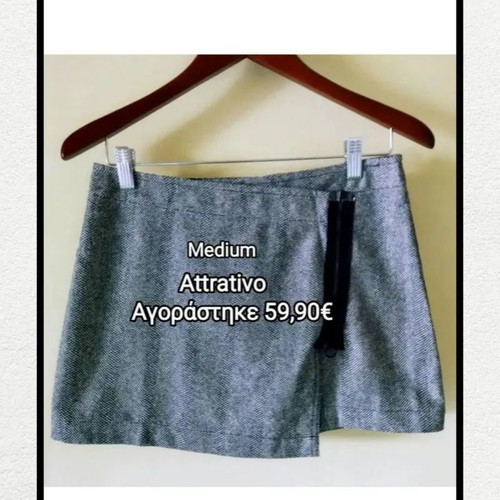 Attrattivo mini φούστα σταυρωτή μεταχειρισμένη με 20% μαλλί