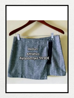 Attrattivo mini φούστα σταυρωτή μεταχειρισμένη με 20% μαλλί