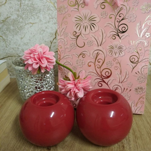Set of two ceramic candlesticks like new, brick coral color