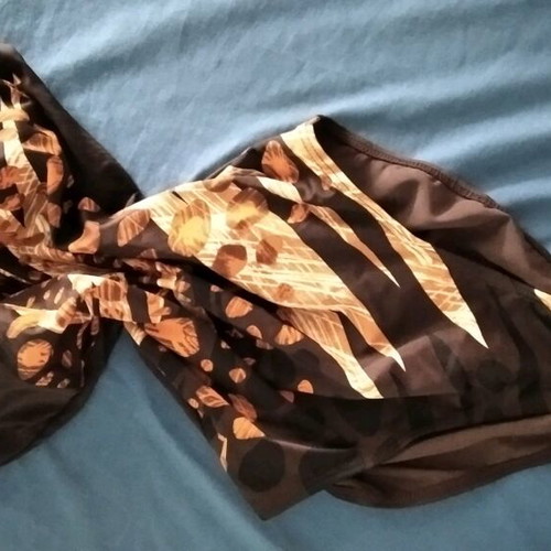 One-piece swimsuit printed black with beige and brick in excellent condition