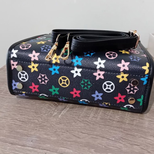 A To Z Greek Mini Handbag like new with colorful geometric patterns