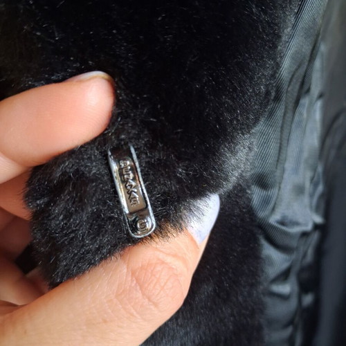 Elegant black fur coat, medium to large size