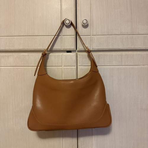Nolah shoulder bag in camel and brown with monogram design