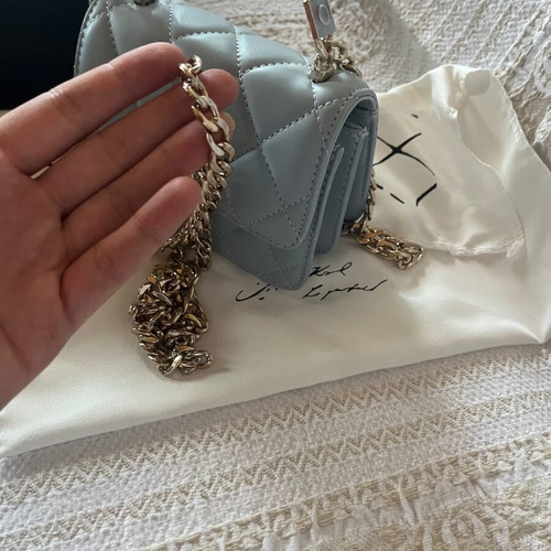 Leather baby blue handbag like new with gold chain and full packaging
