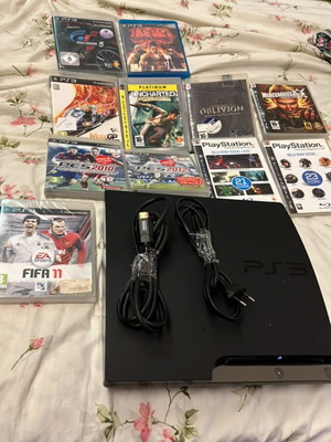 PlayStation 3 Slim console like new with 9 games and 2 demo discs