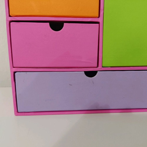 Colorful desktop organiser with drawers used