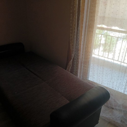 Sofa set with storage, kitchen, and microwave oven like new