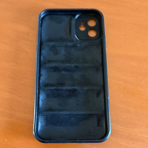 iPhone 11 case black leatherette with embossed design used