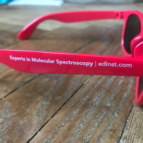 Sunglasses like new with red plastic frame