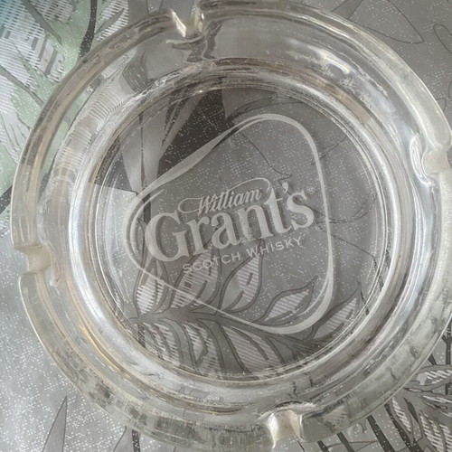 Glass ashtray used with Grant's whisky logo