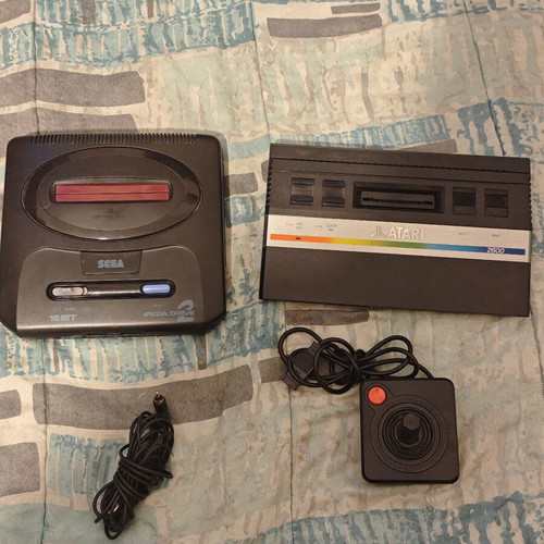 Atari 2600 and Sega Mega Drive 2 consoles