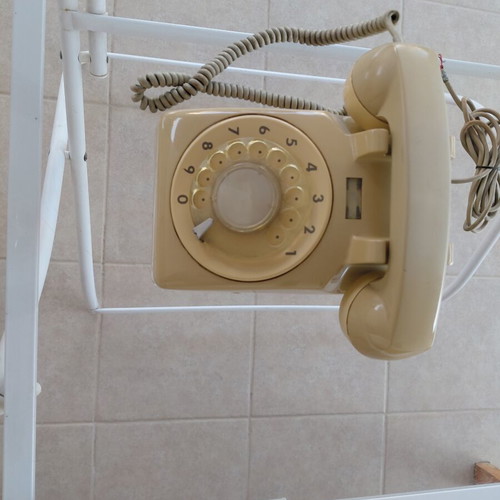 Two OTE wired telephones, beige