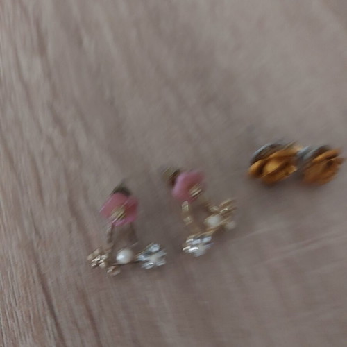 Set of four pairs of earrings like new, black and gold