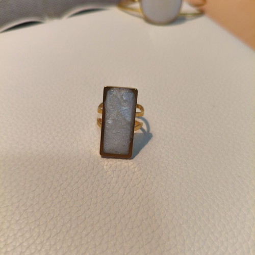 Handmade adjustable statement ring with white resin and gold base