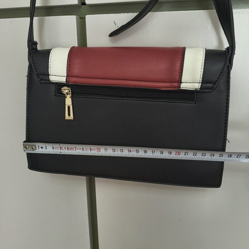 Shoulder bag with adjustable strap, black and red