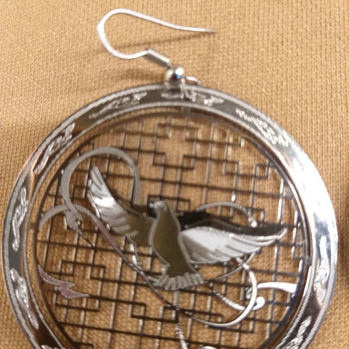 Eirinis hanging earrings new, silver with dove design