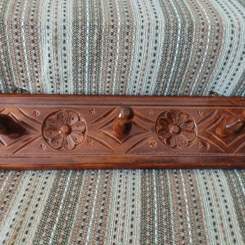 Vintage carved wooden coat rack with three hooks