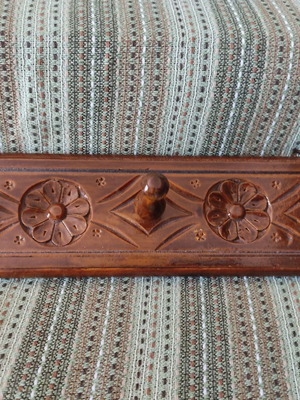 Vintage carved wooden coat rack with three hooks