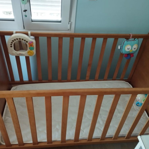 Baby cot used with mattress and adjustable height