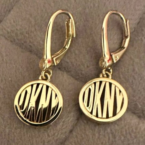 DKNY earrings like new, gold color