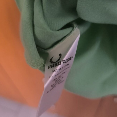 Fred Perry XL t-shirt used with some print cracks, green