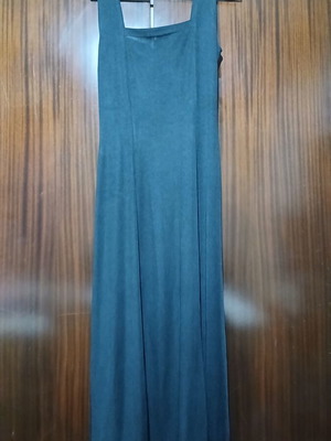 Black maxi dress with open back and decorative ring
