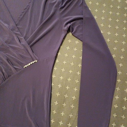 Women's purple wrap blouse like new with small jewel, size S