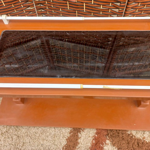 Small wheeled bar used with glass top and storage shelf